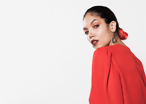 Beyond the Lens: Isabelle Bataglin on Cultivating Diversity and Empathy in Modern Portraiture Young woman starring over her shoulder